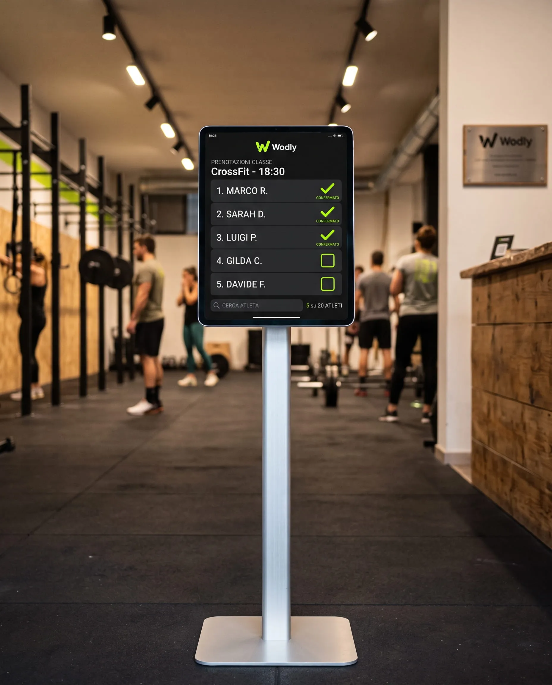 Tablet self check-in kiosk at a gym entrance